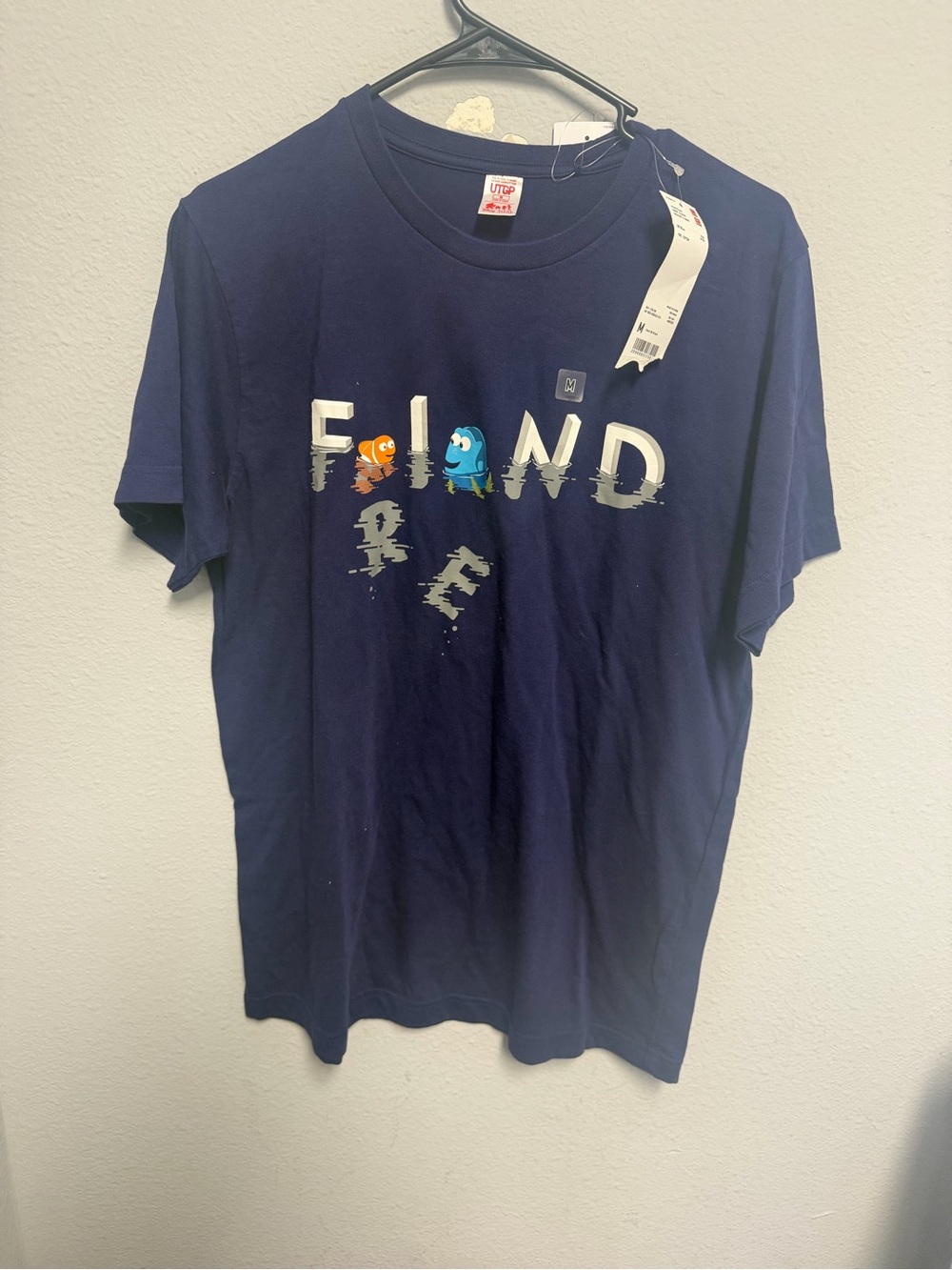 Uniqlo Navy Short-Sleeve 'Find' Graphic Tee with Colorful Characters